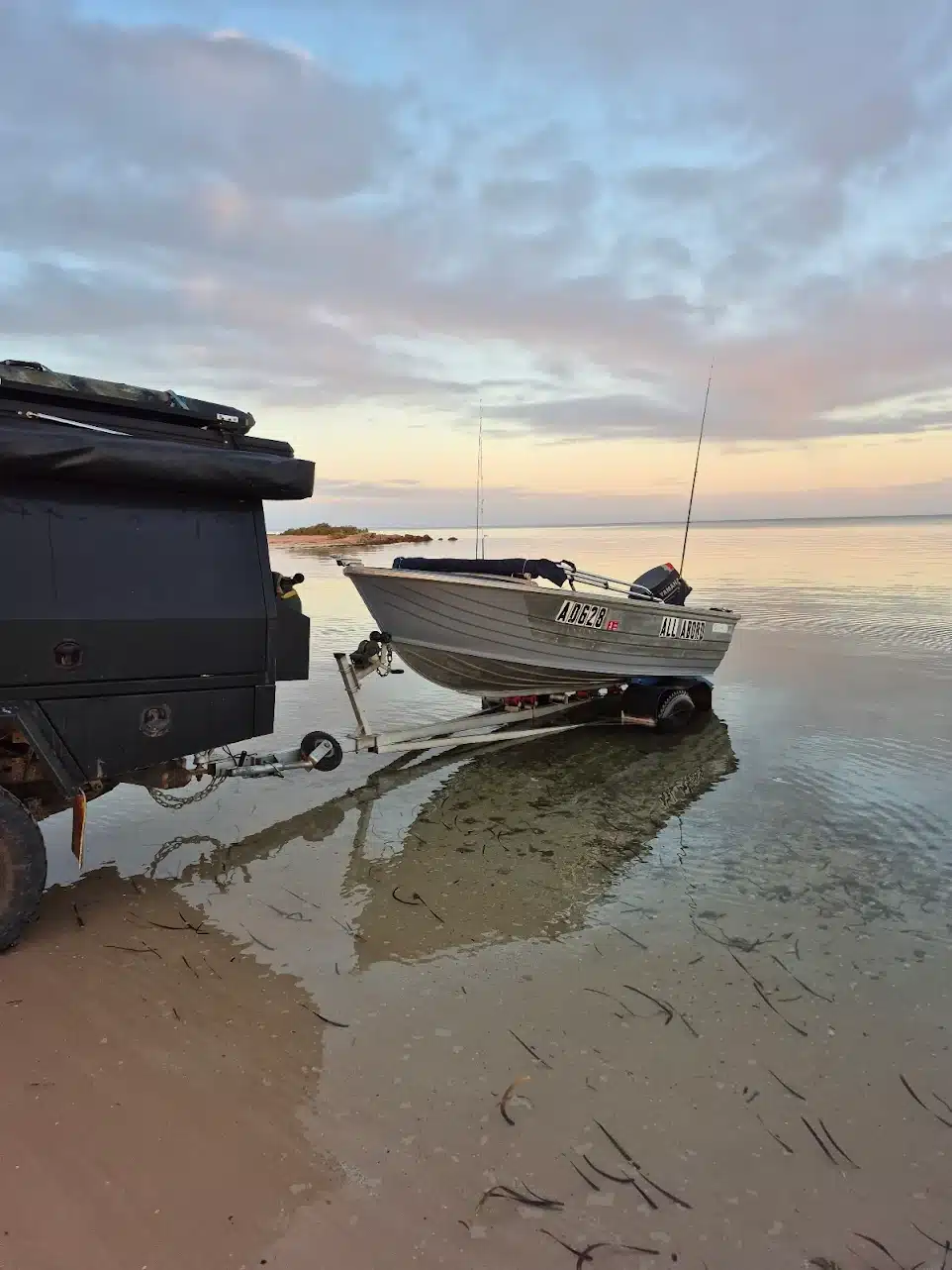 Hire a Boat Denham – Explore Shark Bay Waters Monkey Mia Boat Hire vessel anchored near Denham beach